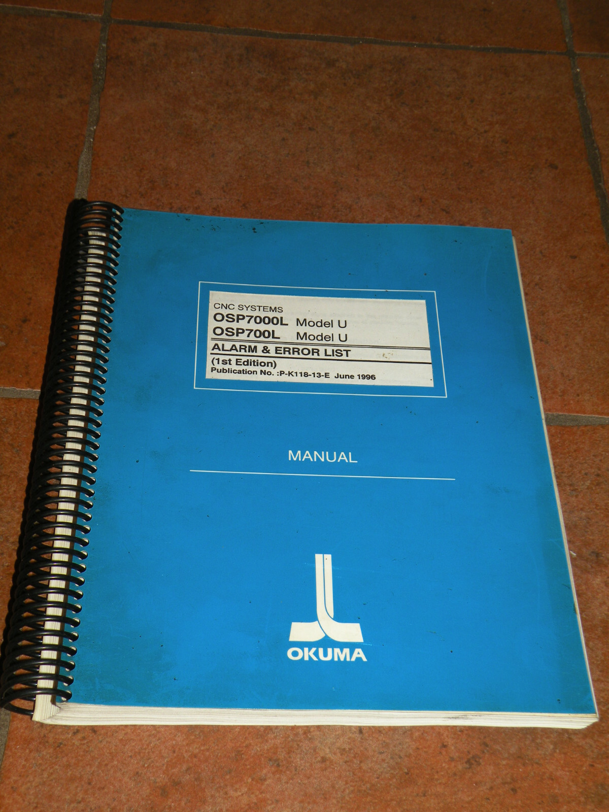 Okuma Alarm & Error List OSP7000L / OSP700L Model U P-K118-13-E June 1996